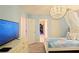 Frozen themed bedroom with a queen bed and TV at 2857 Bookmark Dr, Kissimmee, FL 34746