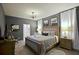 King-size bed, TV, and ensuite bathroom access in this bedroom at 2857 Bookmark Dr, Kissimmee, FL 34746