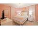 Bedroom with queen-size bed, TV, and stylish decor at 2857 Bookmark Dr, Kissimmee, FL 34746