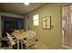 Covered patio with dining table and access to interior at 2857 Bookmark Dr, Kissimmee, FL 34746