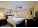 Bedroom with a king-size bed and ceiling fan at 2857 Bookmark Dr, Kissimmee, FL 34746