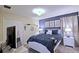 Bedroom with a queen-size bed and TV at 2857 Bookmark Dr, Kissimmee, FL 34746