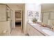 Modern bathroom with double vanity and walk-in shower at 2857 Bookmark Dr, Kissimmee, FL 34746
