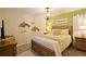 Bedroom with coastal decor and TV at 2857 Bookmark Dr, Kissimmee, FL 34746