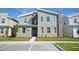 Modern two-story house with stone accents; new construction at 2857 Bookmark Dr, Kissimmee, FL 34746