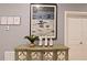 Hallway with console table and art at 2857 Bookmark Dr, Kissimmee, FL 34746