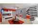 Mickey Mouse themed bedroom with bunk beds and red accents at 2857 Bookmark Dr, Kissimmee, FL 34746