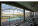 Relaxing pool and spa area with patio furniture and lake view at 2857 Bookmark Dr, Kissimmee, FL 34746