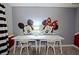 White desk with Mickey and Minnie Mouse wall art at 2857 Bookmark Dr, Kissimmee, FL 34746