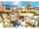 Community fire pit with surrounding seating at 1959 Tropical Palms Cir, Kissimmee, FL 34747