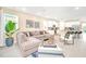 Open living room with a large sectional sofa, creating a comfortable and inviting space at 1959 Tropical Palms Cir, Kissimmee, FL 34747