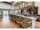 Community bar with a long counter and bar stools at 1959 Tropical Palms Cir, Kissimmee, FL 34747