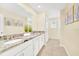Bathroom with granite countertop and double sinks at 1959 Tropical Palms Cir, Kissimmee, FL 34747