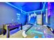 Fun game room with foosball, air hockey, and basketball game at 1959 Tropical Palms Cir, Kissimmee, FL 34747