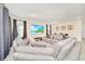 Spacious theater room with large sectional sofa and large TV at 1959 Tropical Palms Cir, Kissimmee, FL 34747