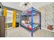 Star Wars themed bedroom with a bunk bed and Star Wars bedding and decor at 1959 Tropical Palms Cir, Kissimmee, FL 34747