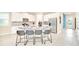 Modern kitchen with large island, stainless steel appliances, and granite countertops at 1959 Tropical Palms Cir, Kissimmee, FL 34747
