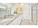 Bathroom with granite countertop and double sinks at 1959 Tropical Palms Cir, Kissimmee, FL 34747