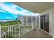 Balcony view overlooking water, with residential buildings in background at 1 John Anderson Dr # 604, Ormond Beach, FL 32176