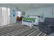 Relaxing main bedroom with large windows and access to balcony at 1 John Anderson Dr # 604, Ormond Beach, FL 32176
