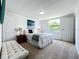 Cozy bedroom with a queen-size bed and ample closet space at 241 Menlo Park Ave, Davenport, FL 33897