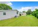 Spacious backyard with lush green grass at 241 Menlo Park Ave, Davenport, FL 33897