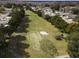Aerial view of a partially visible golf course at 241 Menlo Park Ave, Davenport, FL 33897