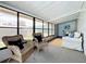 Bright and airy sunroom, featuring comfortable seating at 241 Menlo Park Ave, Davenport, FL 33897
