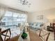Bright living room with a view of the pool and patio at 7663 Sir Kaufmann Ct, Kissimmee, FL 34747