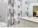 Clean bathroom with a shower/tub combo and vanity at 7663 Sir Kaufmann Ct, Kissimmee, FL 34747