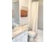 Clean bathroom with a tub, toilet and vanity at 7663 Sir Kaufmann Ct, Kissimmee, FL 34747