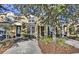 Two-story townhome with a welcoming front yard and driveway at 7663 Sir Kaufmann Ct, Kissimmee, FL 34747