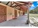 Covered walkway and stalls along side of barn at 8901 Nw 136Th Avenue Rd, Ocala, FL 34482