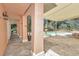 Covered patio area overlooking the pool and fountain at 8901 Nw 136Th Avenue Rd, Ocala, FL 34482