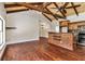 Open living room with hardwood floors and kitchen access at 8901 Nw 136Th Avenue Rd, Ocala, FL 34482