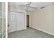 Spacious bedroom with double door closet and carpeted floors at 8901 Nw 136Th Avenue Rd, Ocala, FL 34482