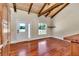 Living room with hardwood floors and access to the backyard at 8901 Nw 136Th Avenue Rd, Ocala, FL 34482