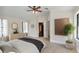 Main bedroom with stylish decor and access to bathroom at 8901 Nw 136Th Avenue Rd, Ocala, FL 34482