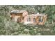 Two-story home with large windows and backyard at 8901 Nw 136Th Avenue Rd, Ocala, FL 34482