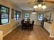 Bright dining room with kitchen access and view at 10566 Cr 671, Bushnell, FL 33513