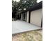 Home exterior with attached two-car garage at 10566 Cr 671, Bushnell, FL 33513