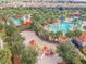 Community playground next to resort-style pool at 7472 Oakmoss Loop, Davenport, FL 33837