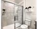 Modern bathroom featuring a large shower and updated fixtures at 7472 Oakmoss Loop, Davenport, FL 33837