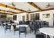 Community room with tables, chairs, and a bar at 7472 Oakmoss Loop, Davenport, FL 33837