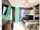 Star Wars themed bedroom with a bunk bed and lighted wall at 7472 Oakmoss Loop, Davenport, FL 33837