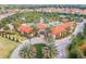 Community clubhouse and pool area with tennis courts at 7472 Oakmoss Loop, Davenport, FL 33837