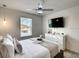 Bedroom with queen bed and TV at 7472 Oakmoss Loop, Davenport, FL 33837