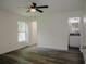 Bedroom with en-suite bathroom and ceiling fan at 604 W 12Th St, Lakeland, FL 33805