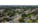 Wide aerial view of a residential neighborhood near a lake at 604 W 12Th St, Lakeland, FL 33805