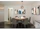 Modern dining room with round table and gray chairs at 604 W 12Th St, Lakeland, FL 33805